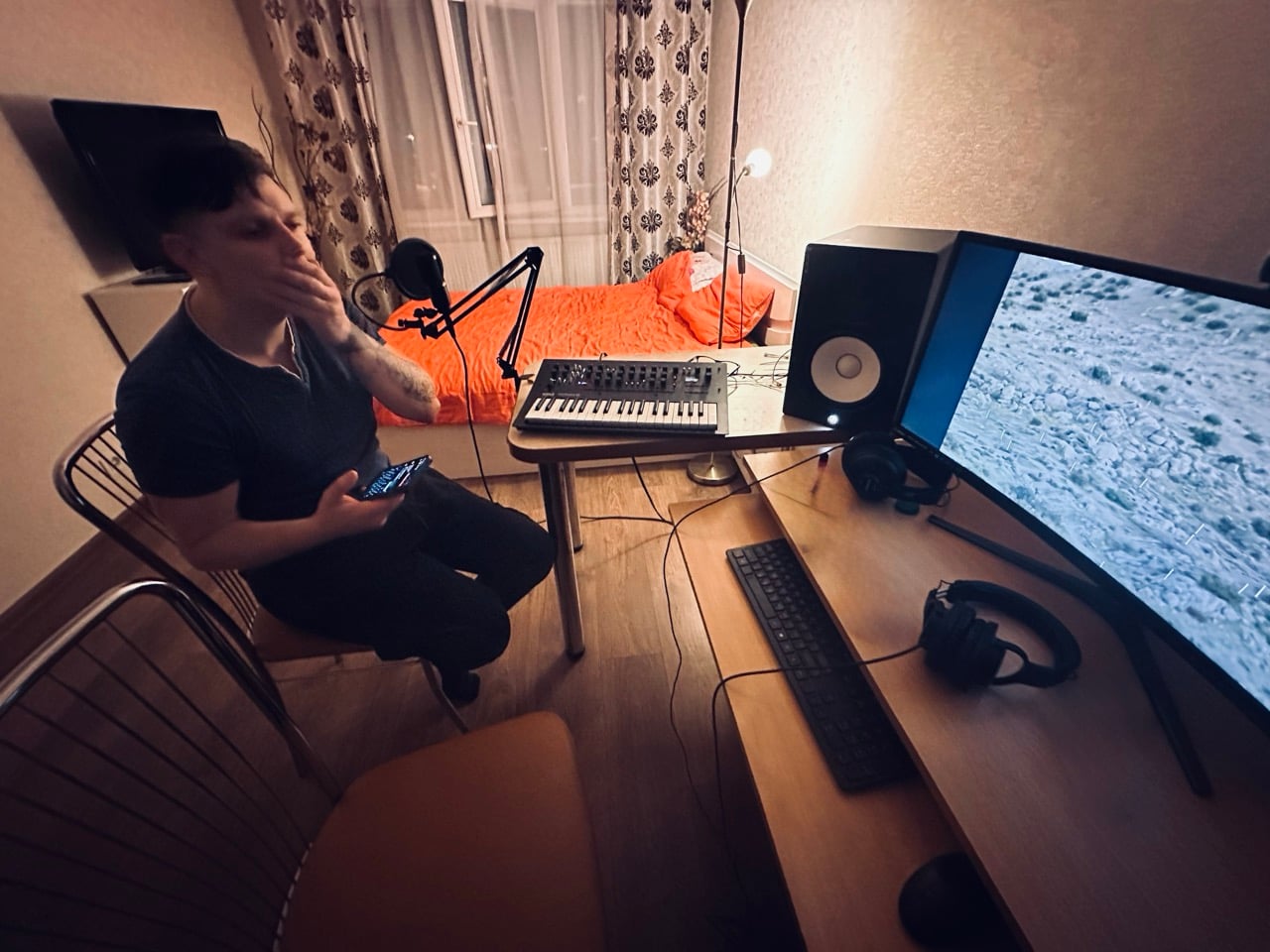 Edvinas Kilbauskas (EddieK) working on music production in Klaipėda home studio